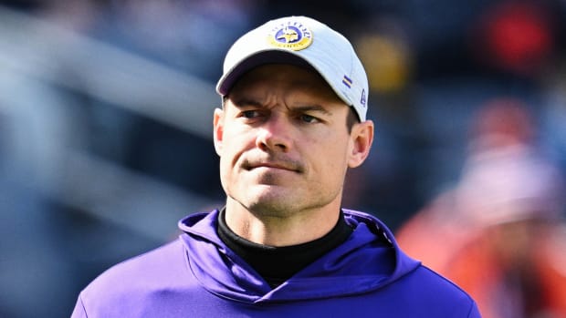 Vikings coach Kevin O’Connell stands on the sidelines.